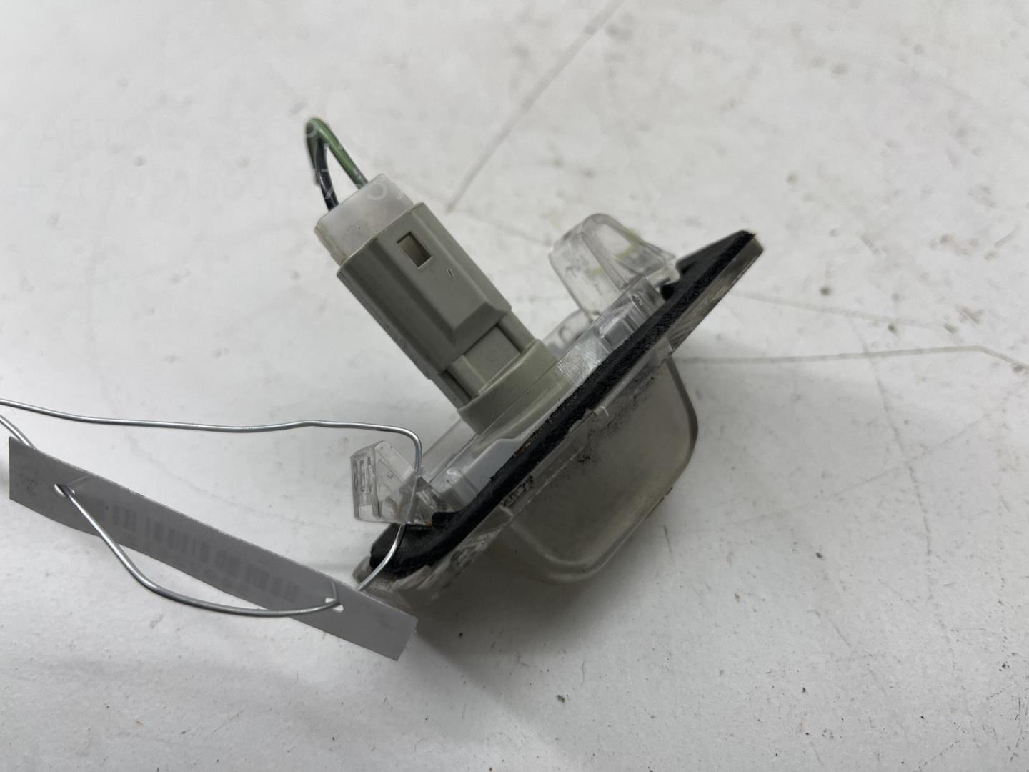 Фонарь подсветки номера