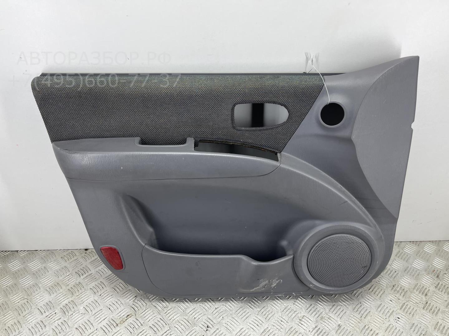 Обшивка двери передней левой