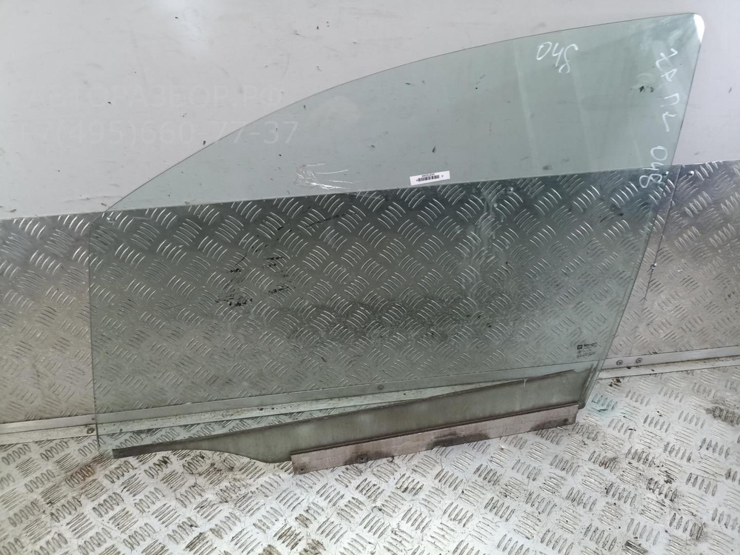 Стекло двери передней левой