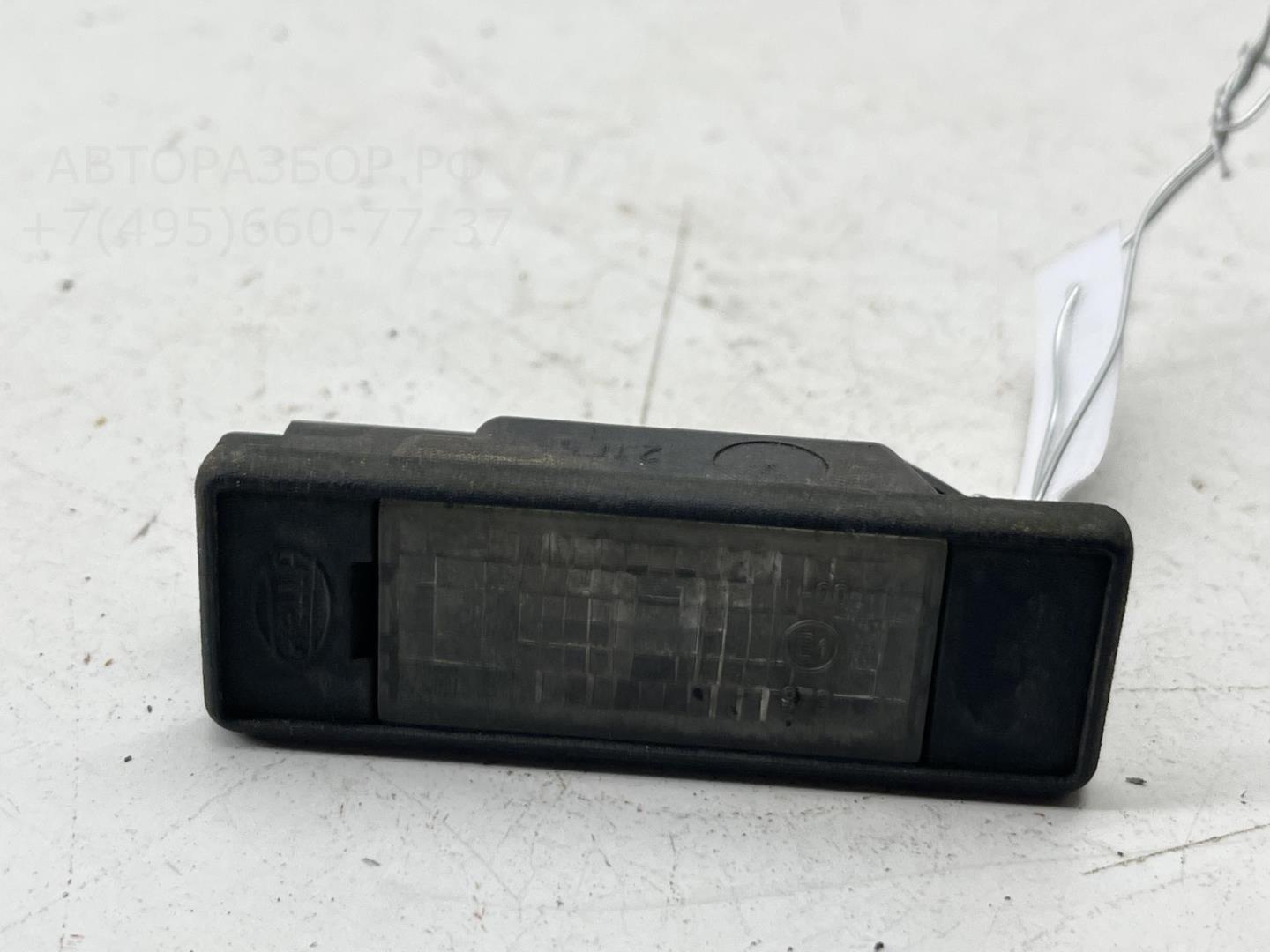 Фонарь подсветки номера