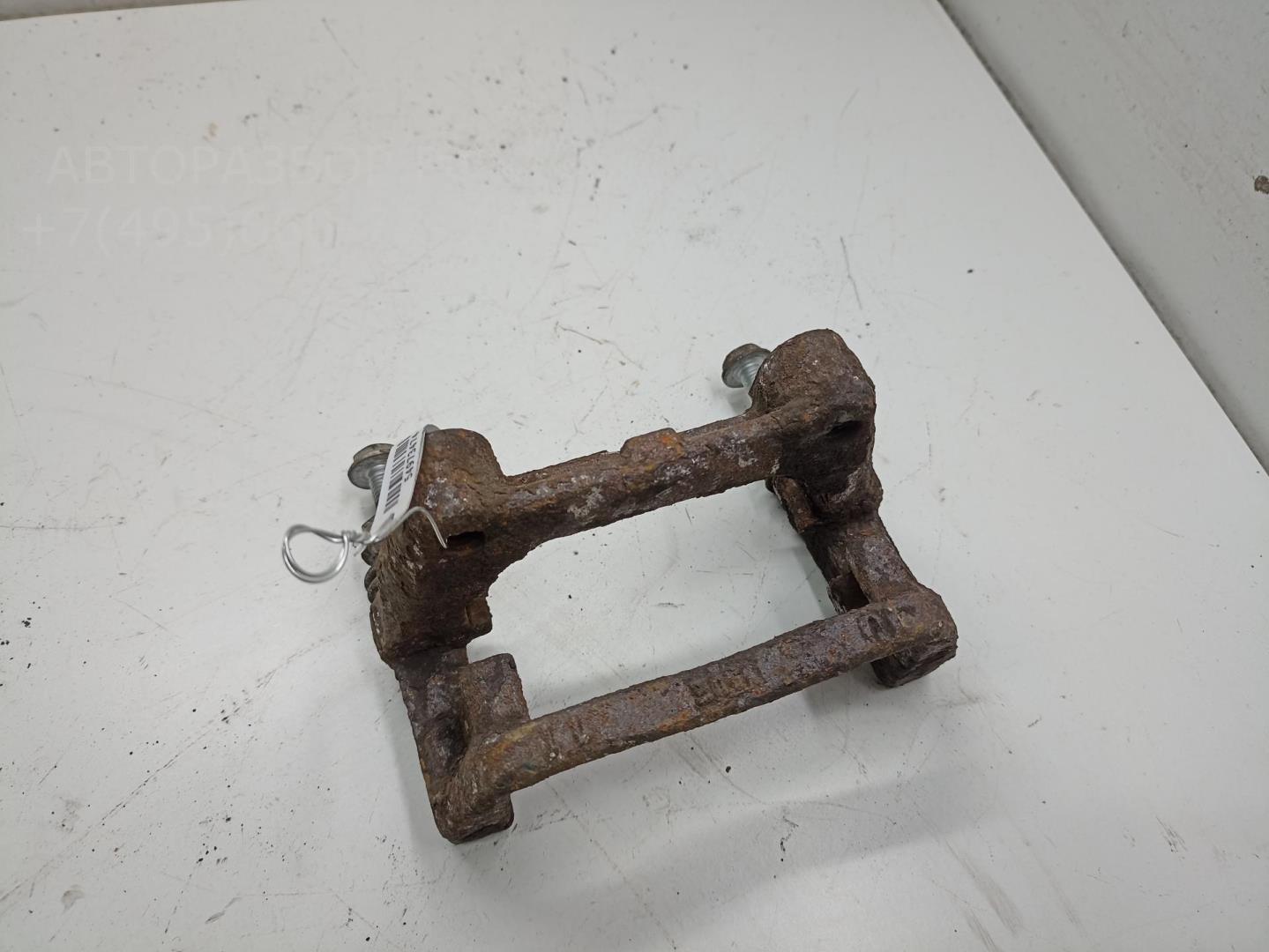 Скоба суппорта заднего