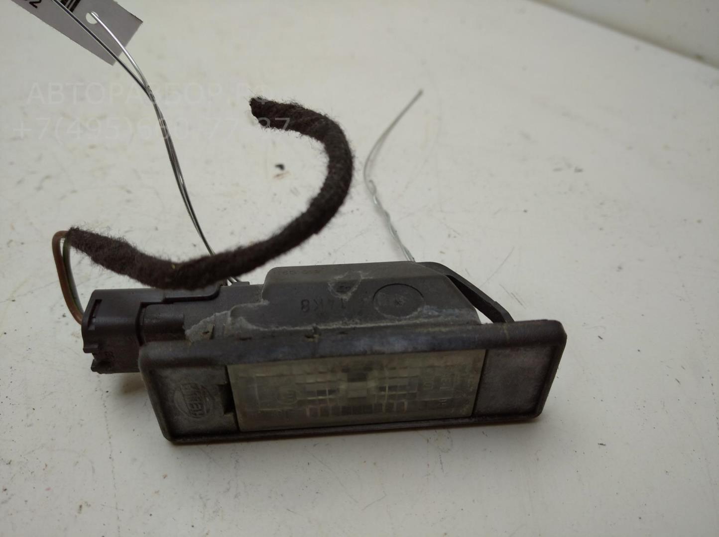 Фонарь подсветки номера