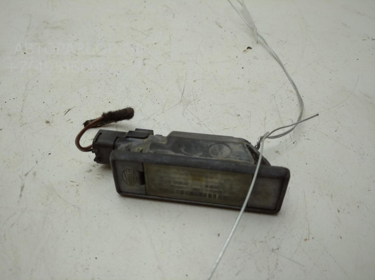 Фонарь подсветки номера