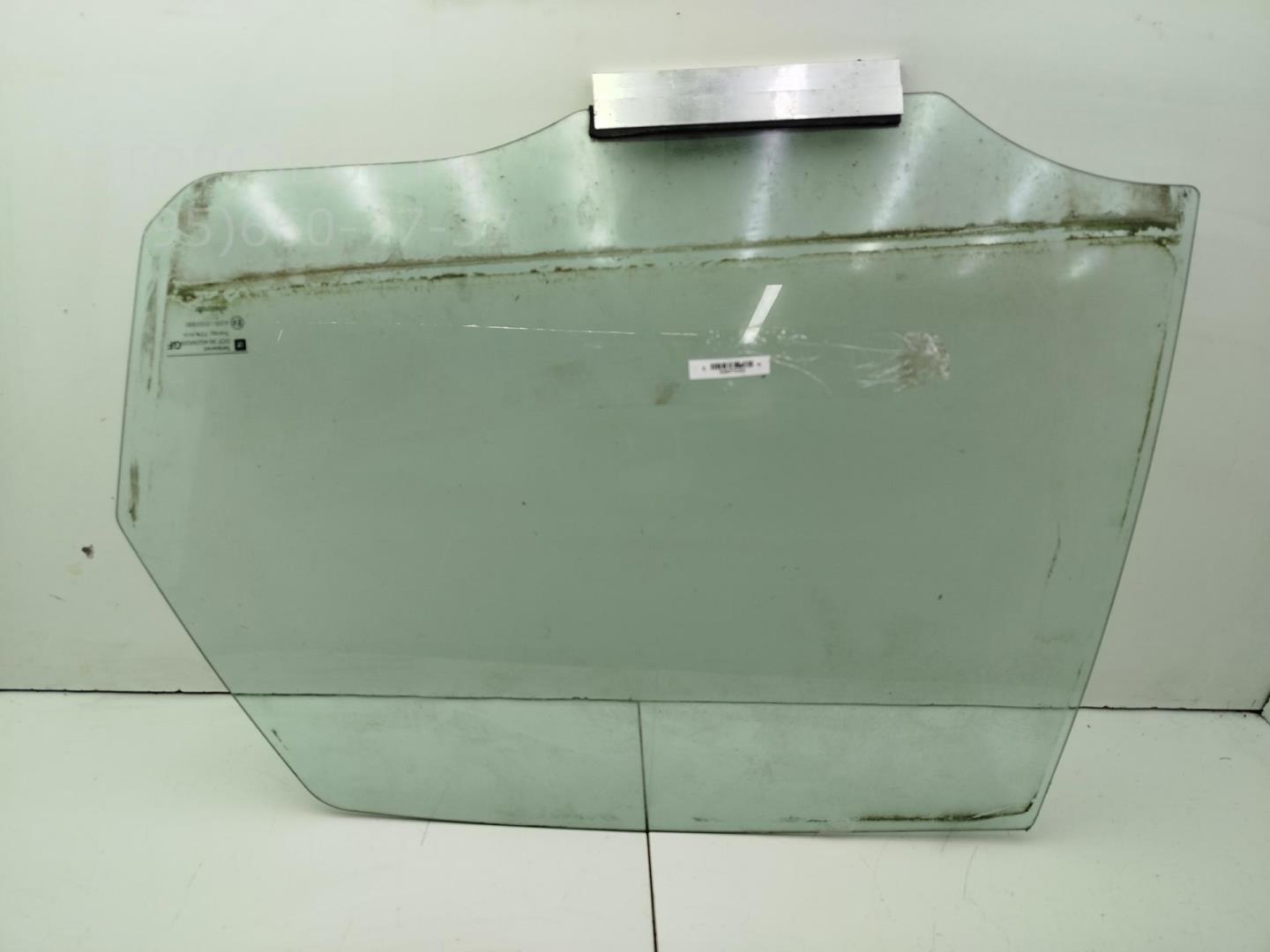 Стекло двери задней левой