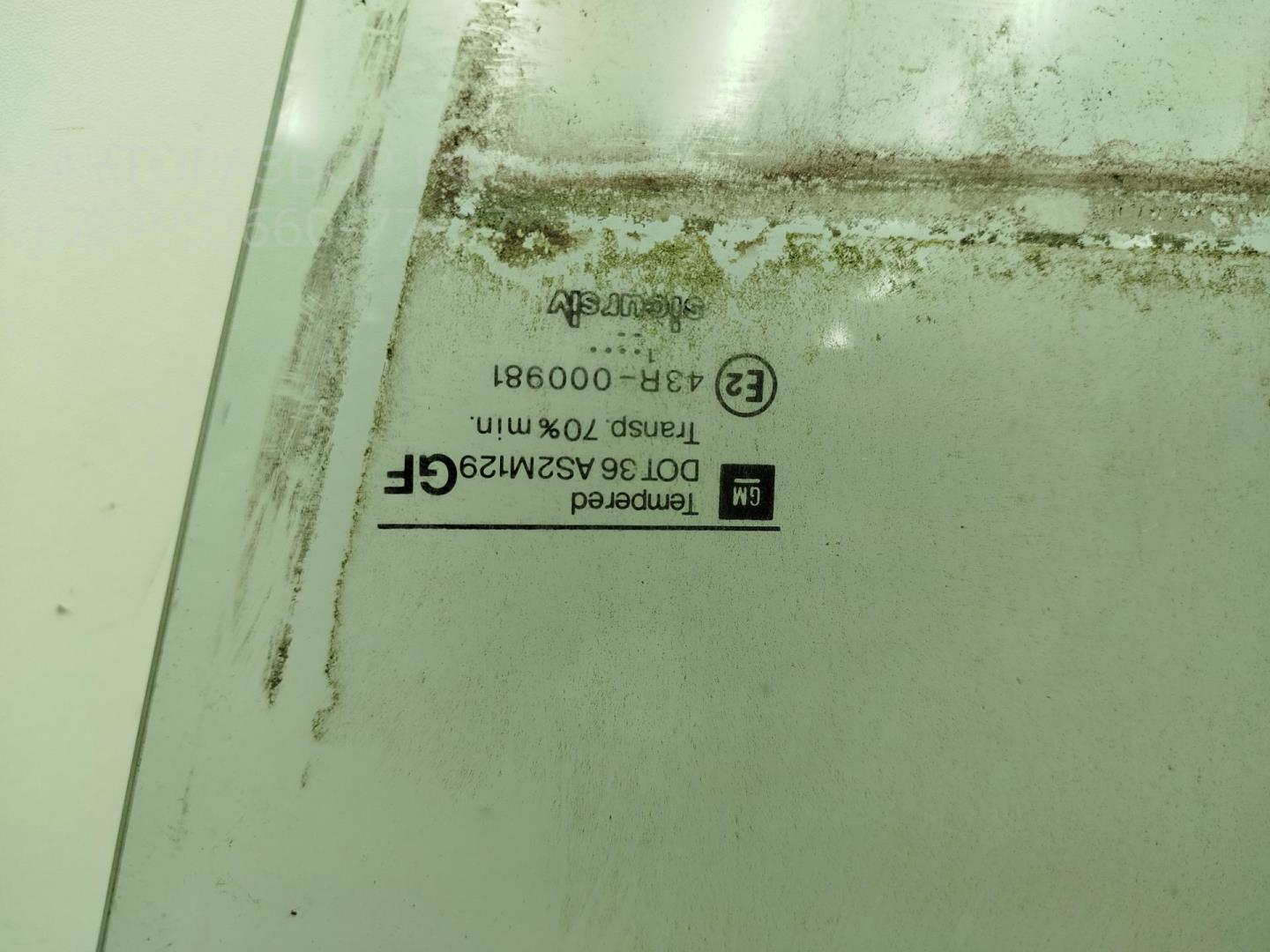 Стекло двери задней левой