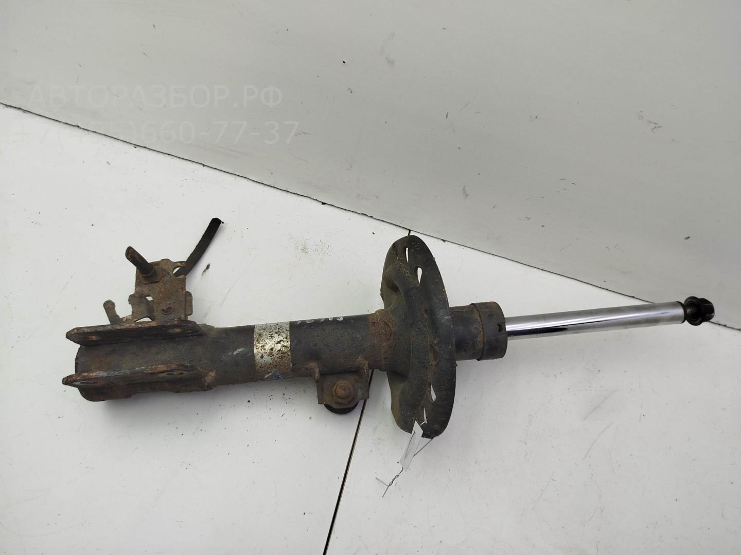 Амортизатор передний левый