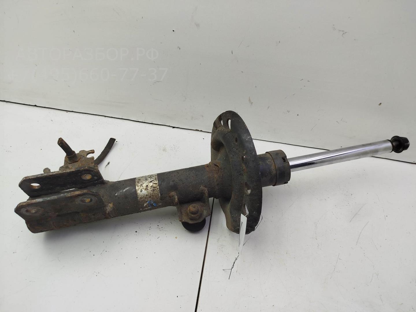 Амортизатор передний левый