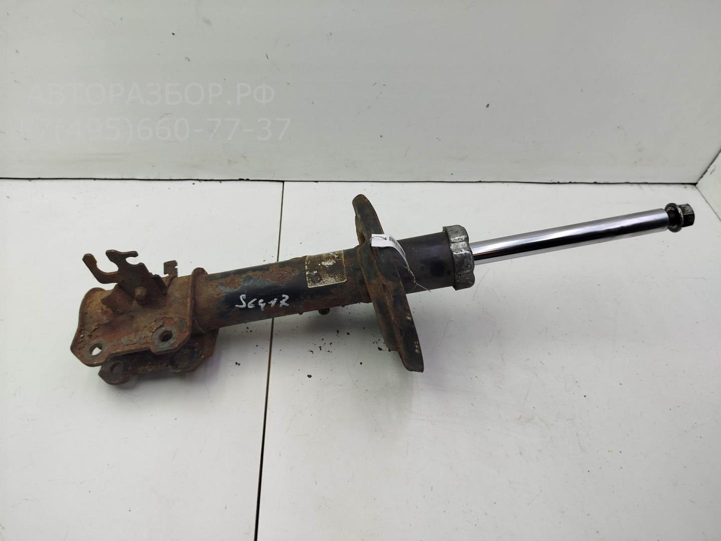 Амортизатор передний левый