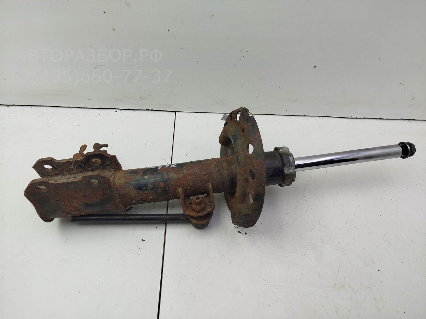 Амортизатор передний левый