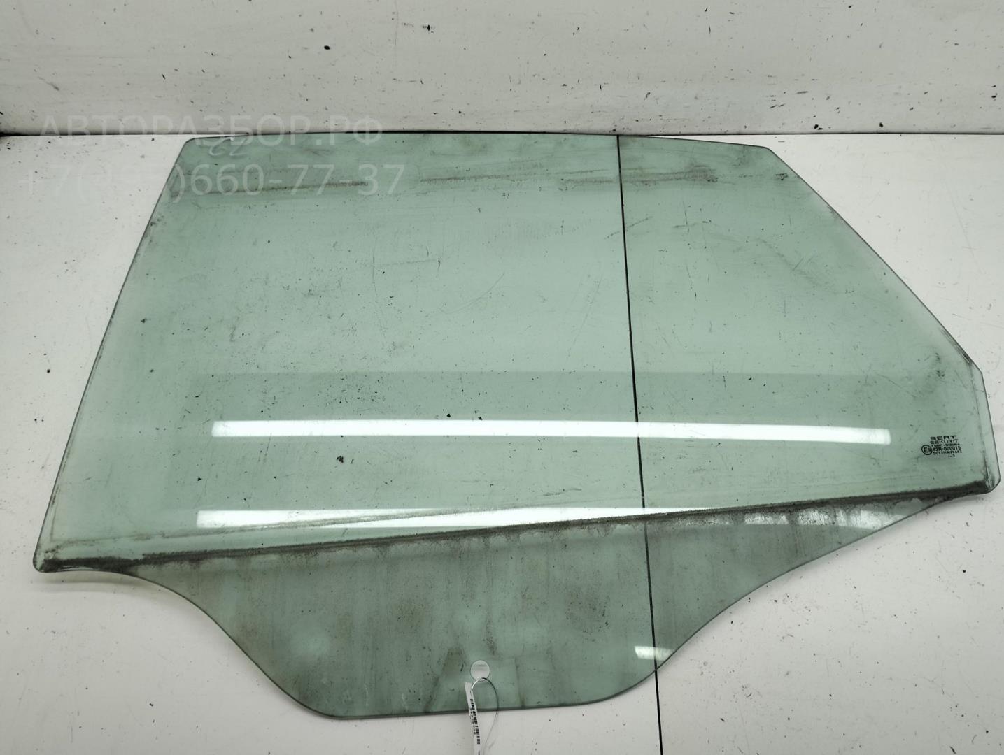 Стекло двери задней левой
