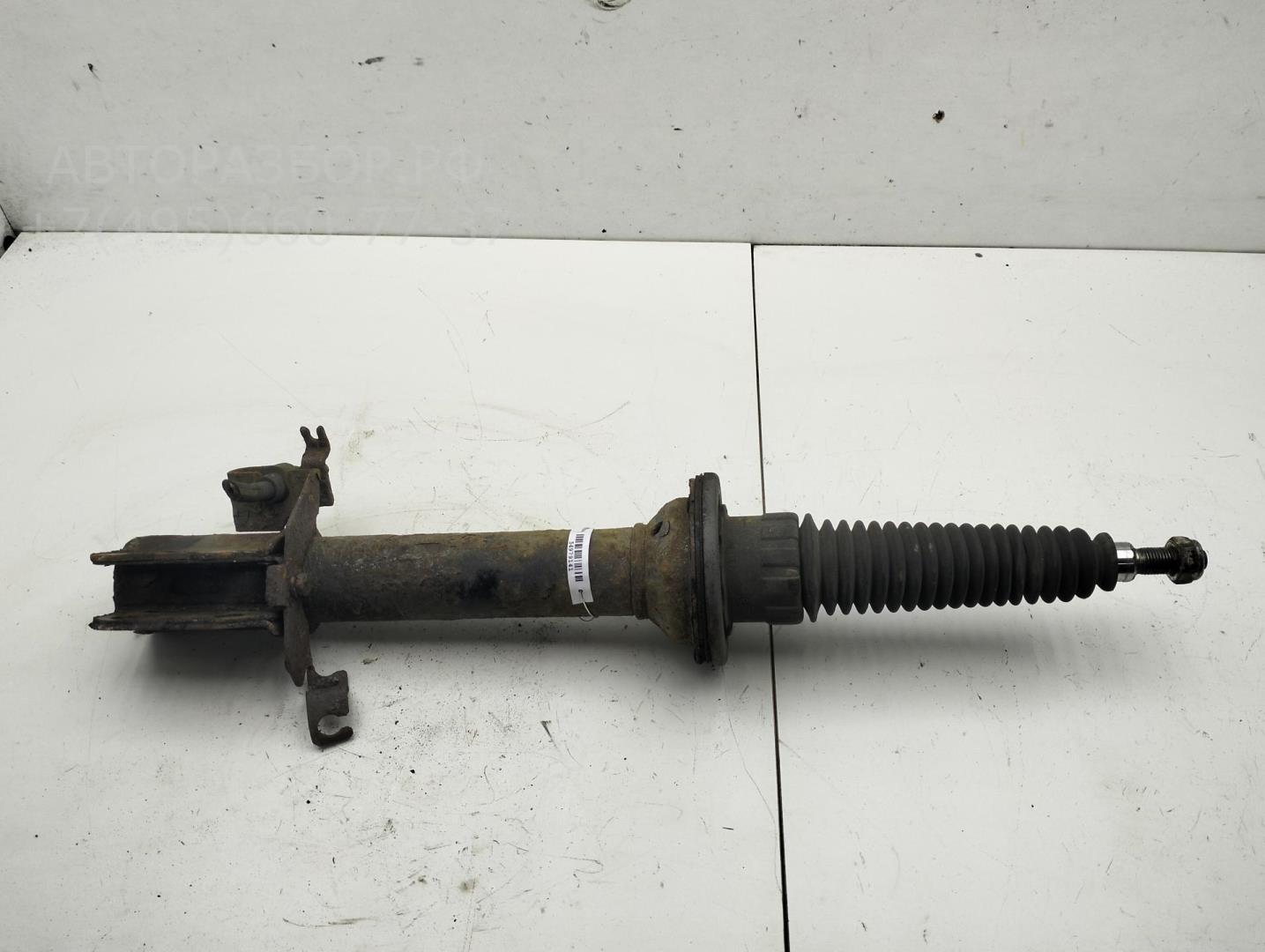 Амортизатор передний левый