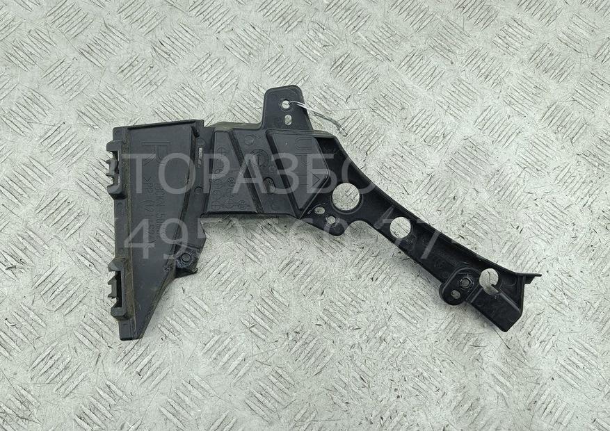 Кронштейн переднего бампера правый