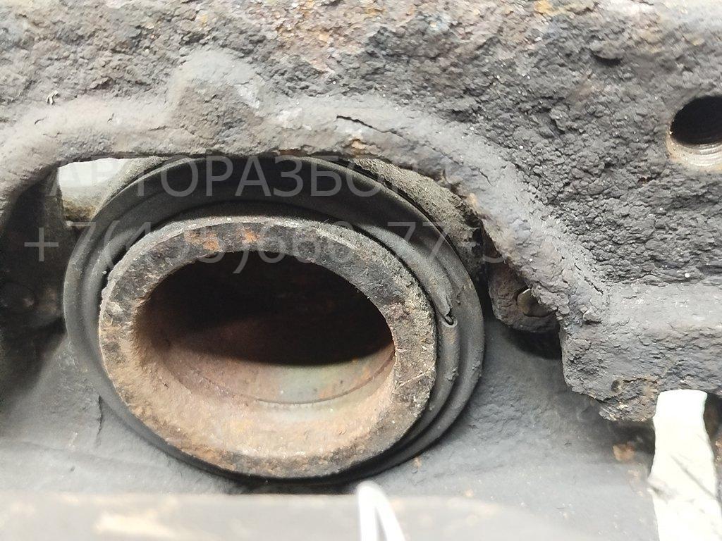 Суппорт передний левый