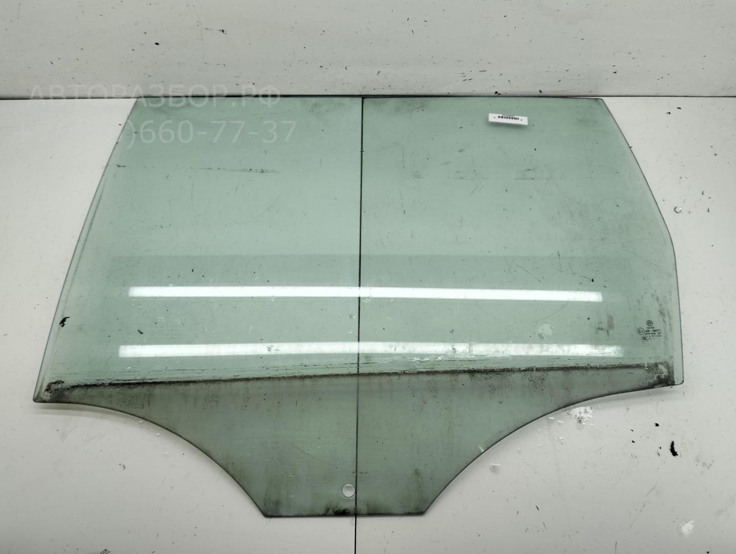 Стекло двери задней левой