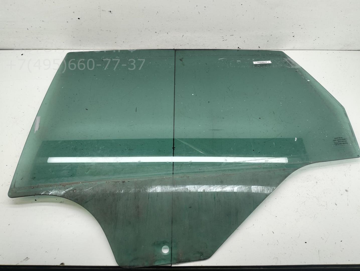 Стекло двери задней левой