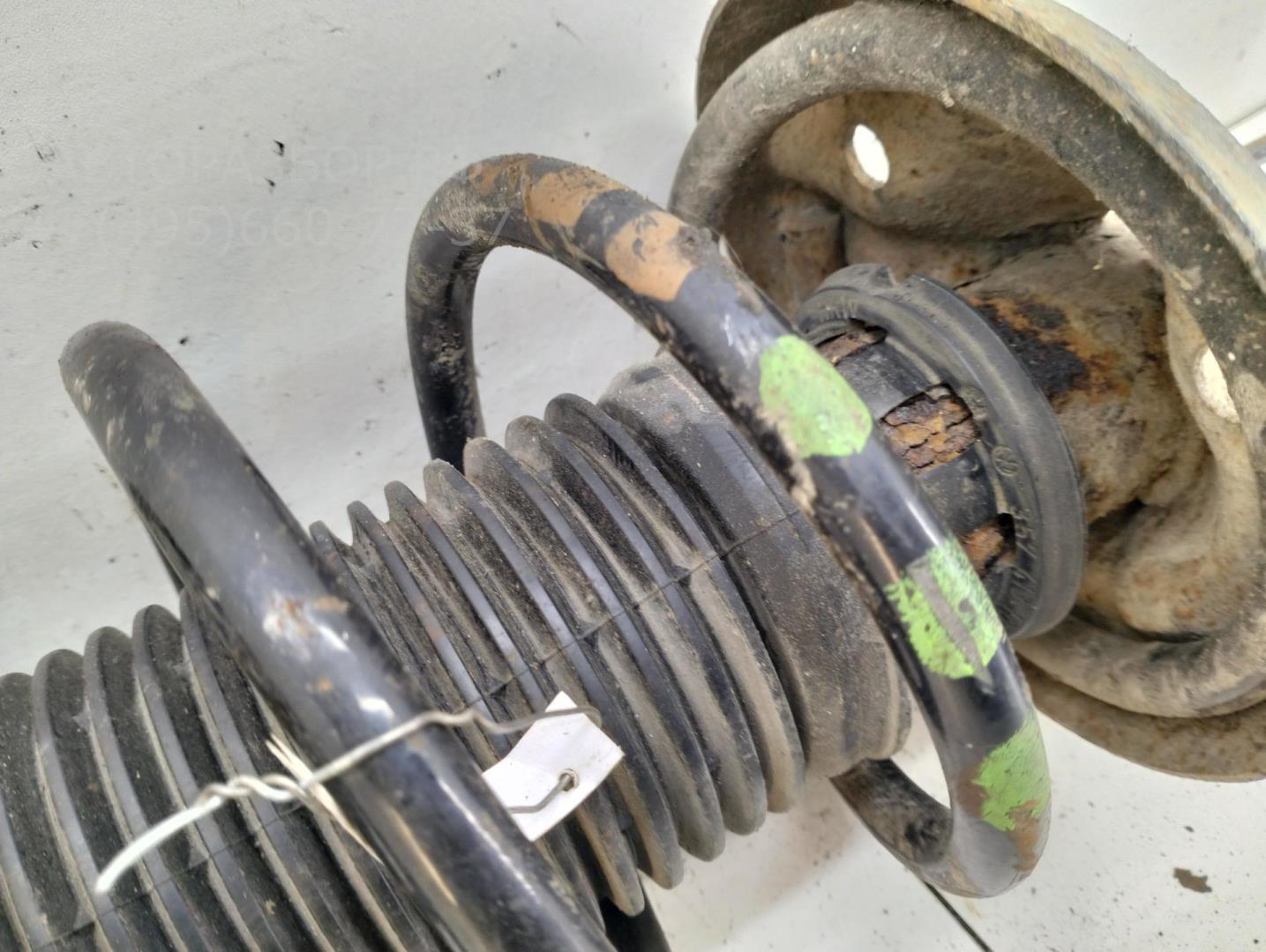 Амортизатор передний левый