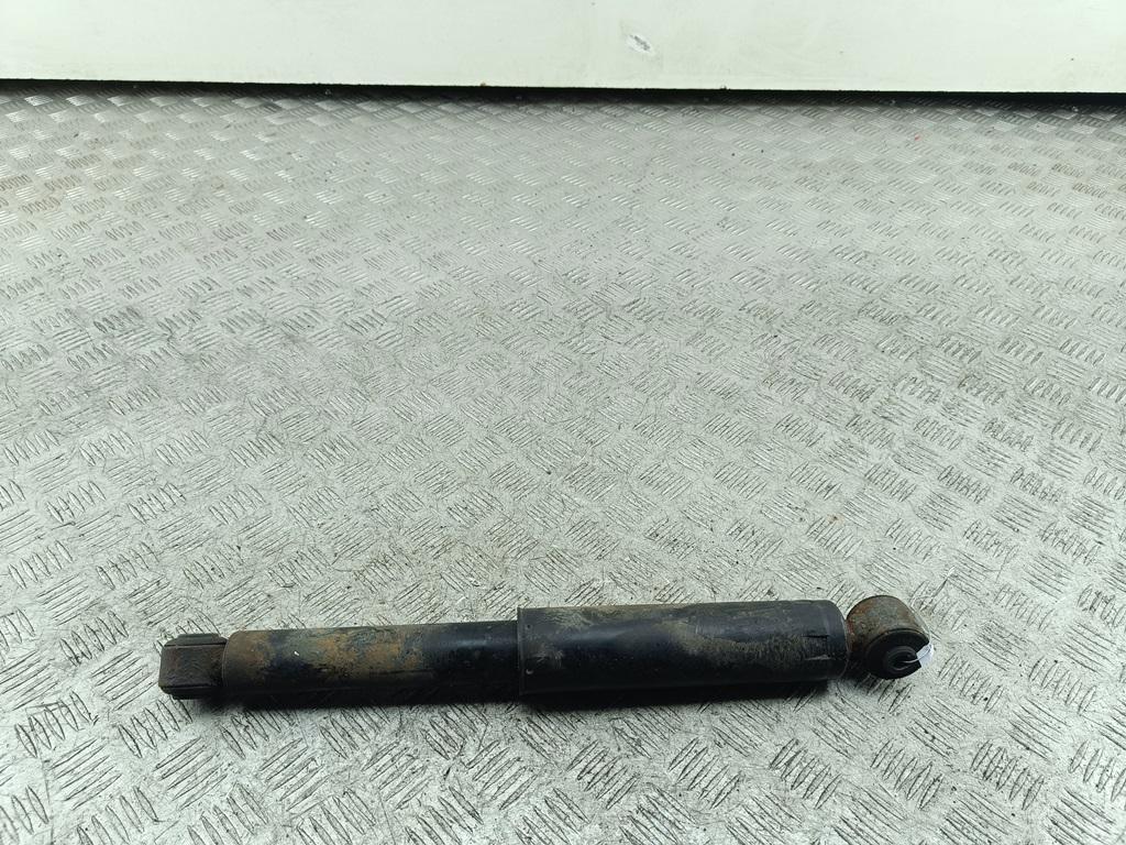 Амортизатор задний левый