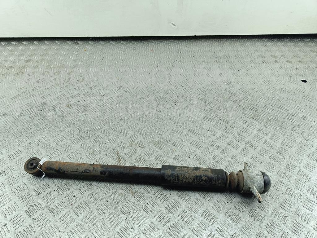 Амортизатор задний левый