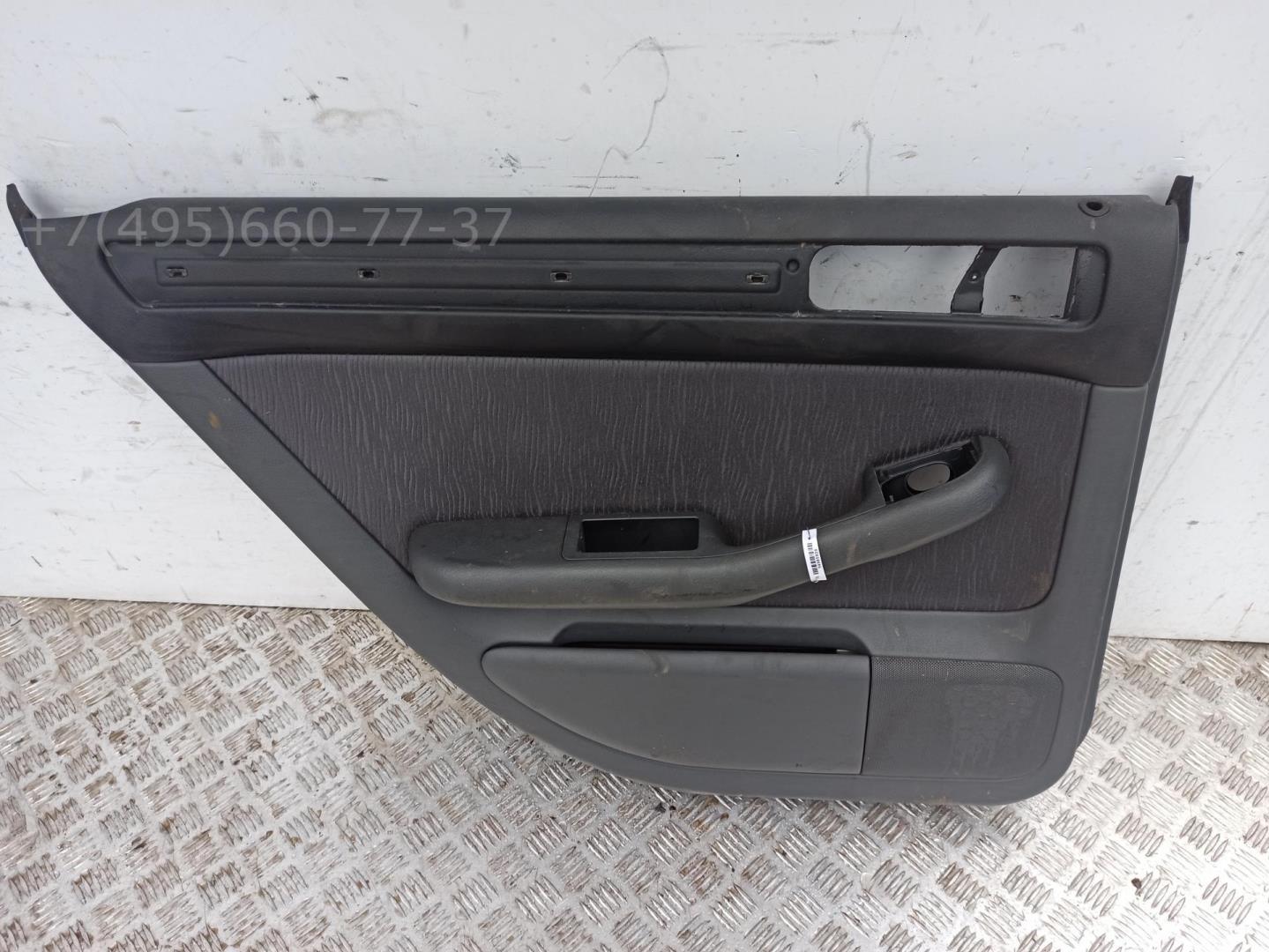 Обшивка двери задней левой