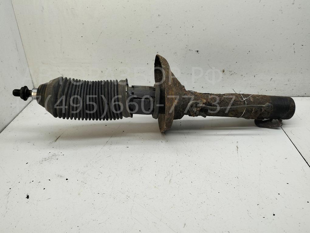 Амортизатор передний левый