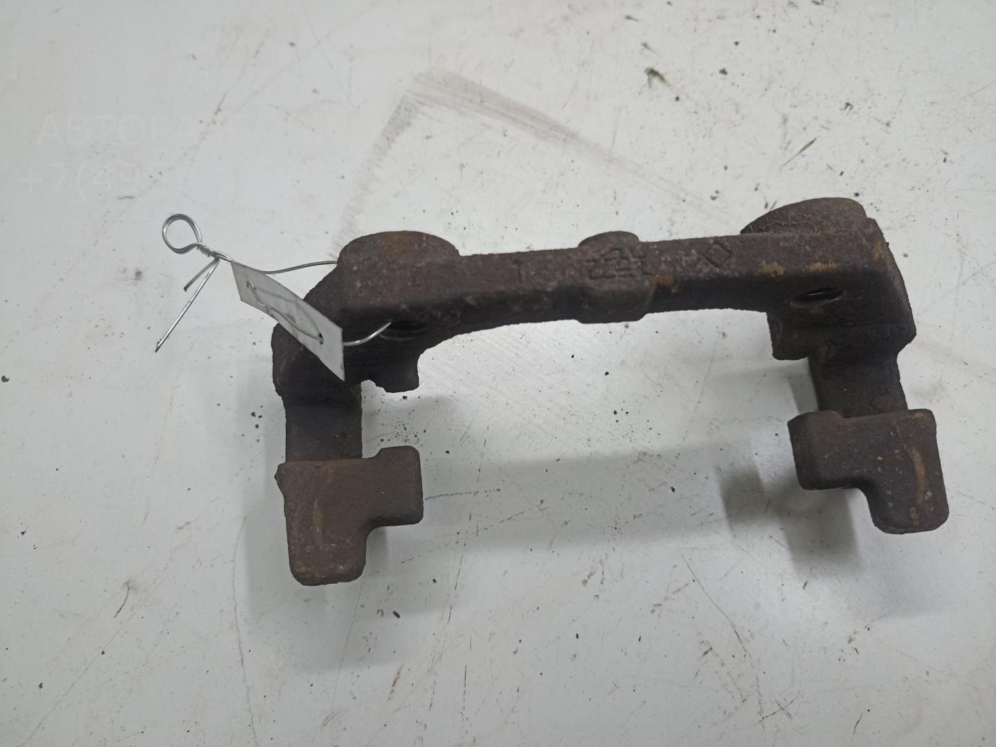 Скоба суппорта заднего