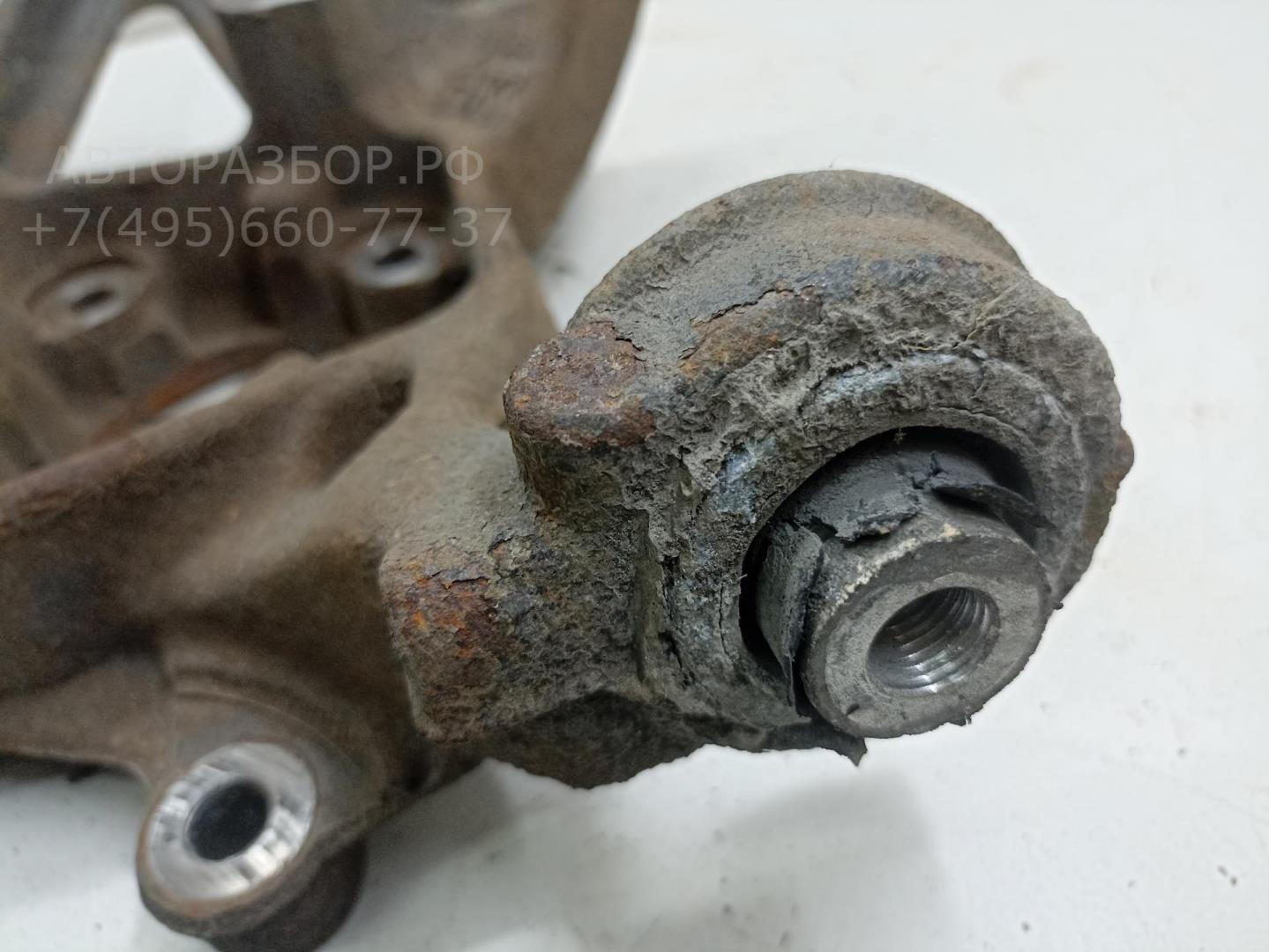 Кулак поворотный задний левый