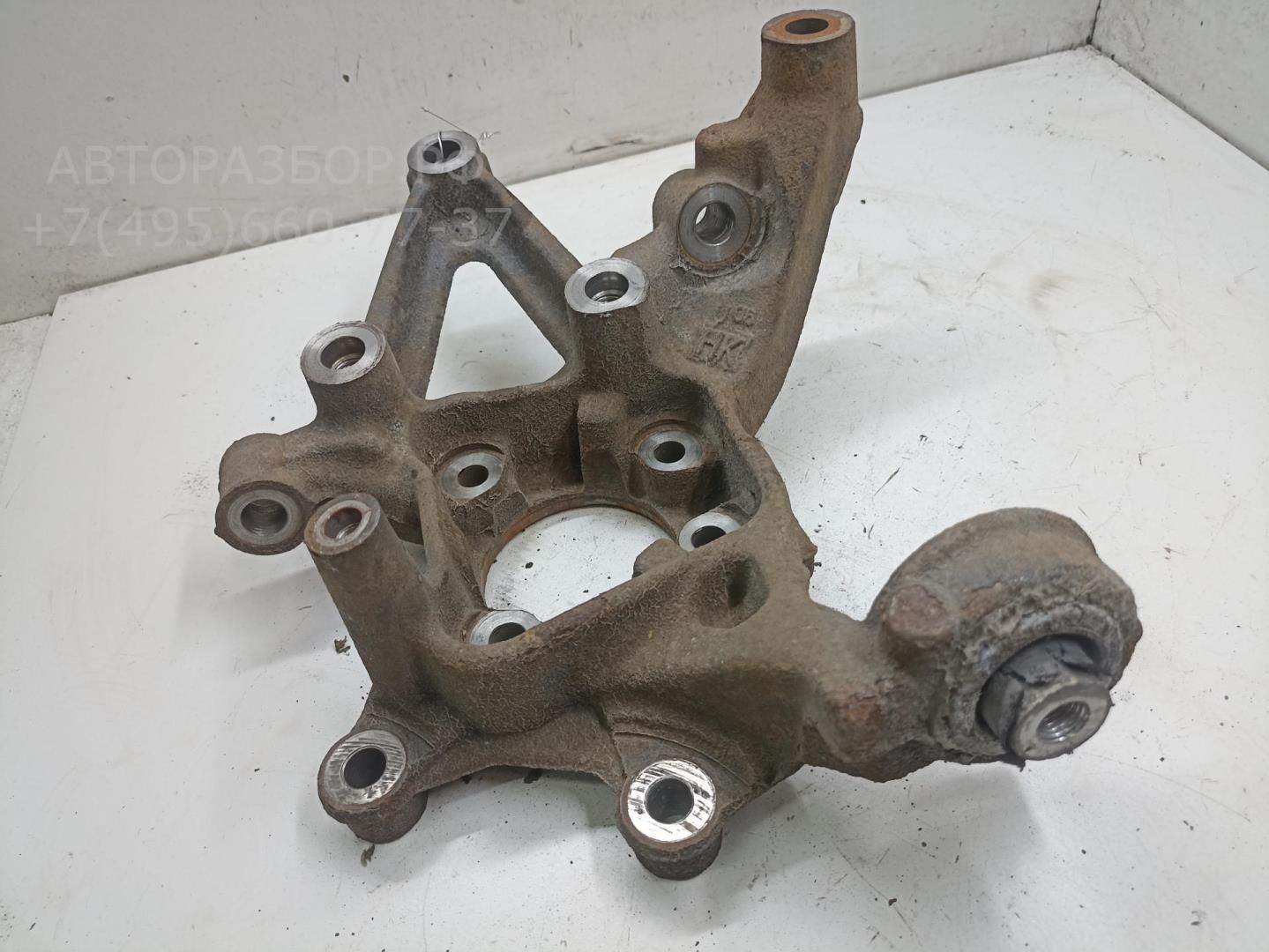 Кулак поворотный задний левый