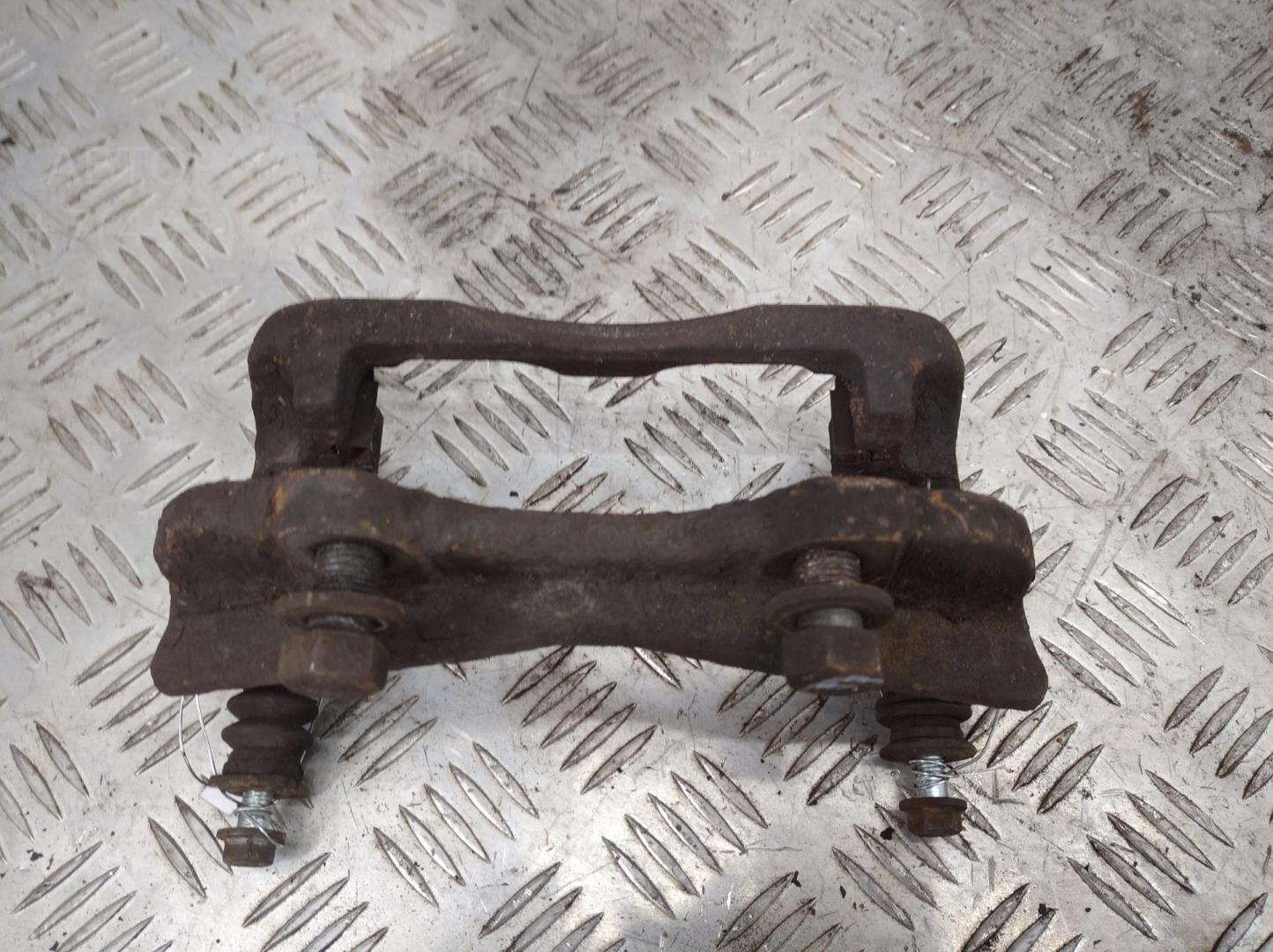 Скоба суппорта переднего