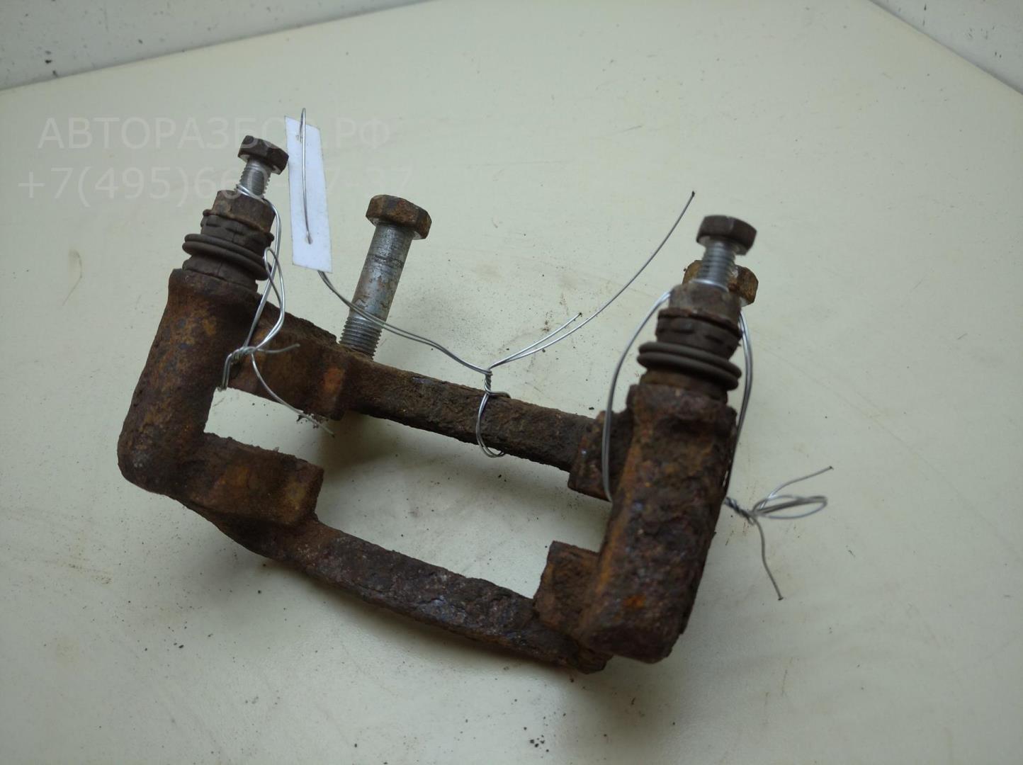 Скоба суппорта заднего