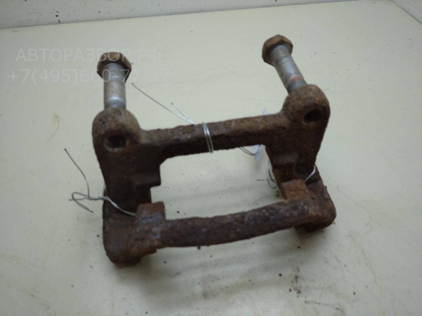 Скоба суппорта заднего