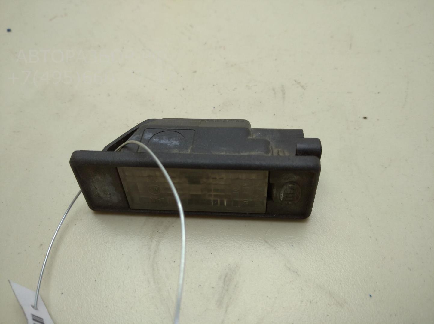 Фонарь подсветки номера