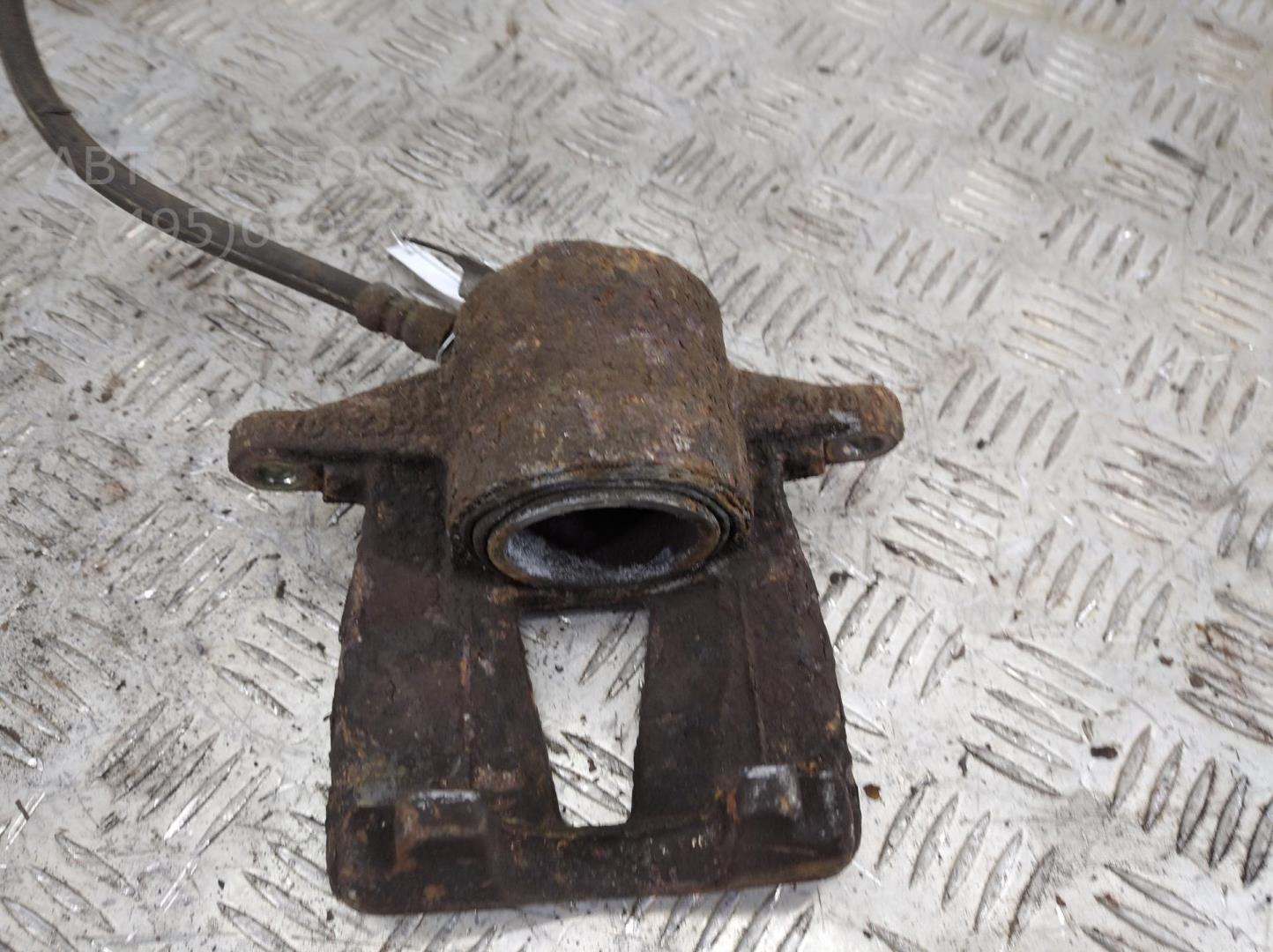 Суппорт передний левый