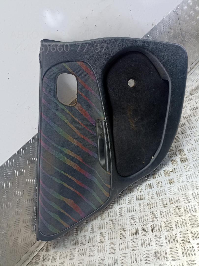 Обшивка двери задней левой