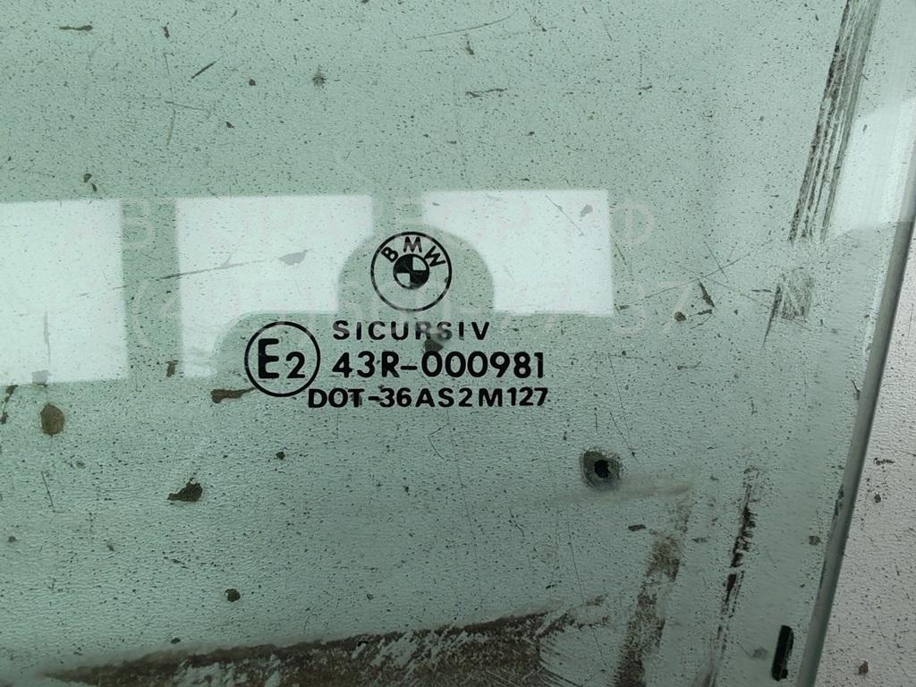 Стекло двери передней левой