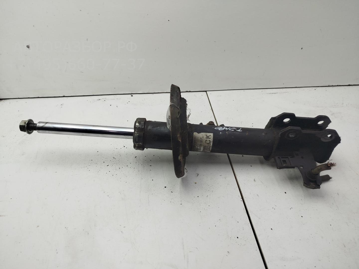 Амортизатор передний левый