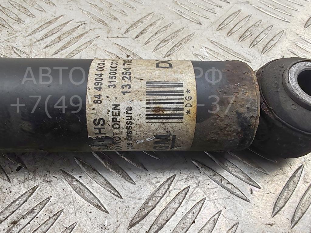 Амортизатор задний левый