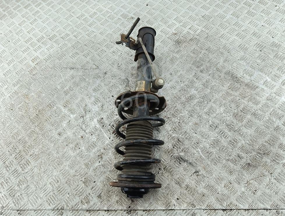 Амортизатор передний левый