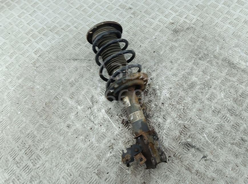 Амортизатор передний левый