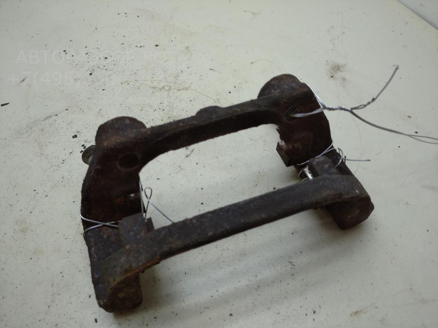 Скоба суппорта заднего