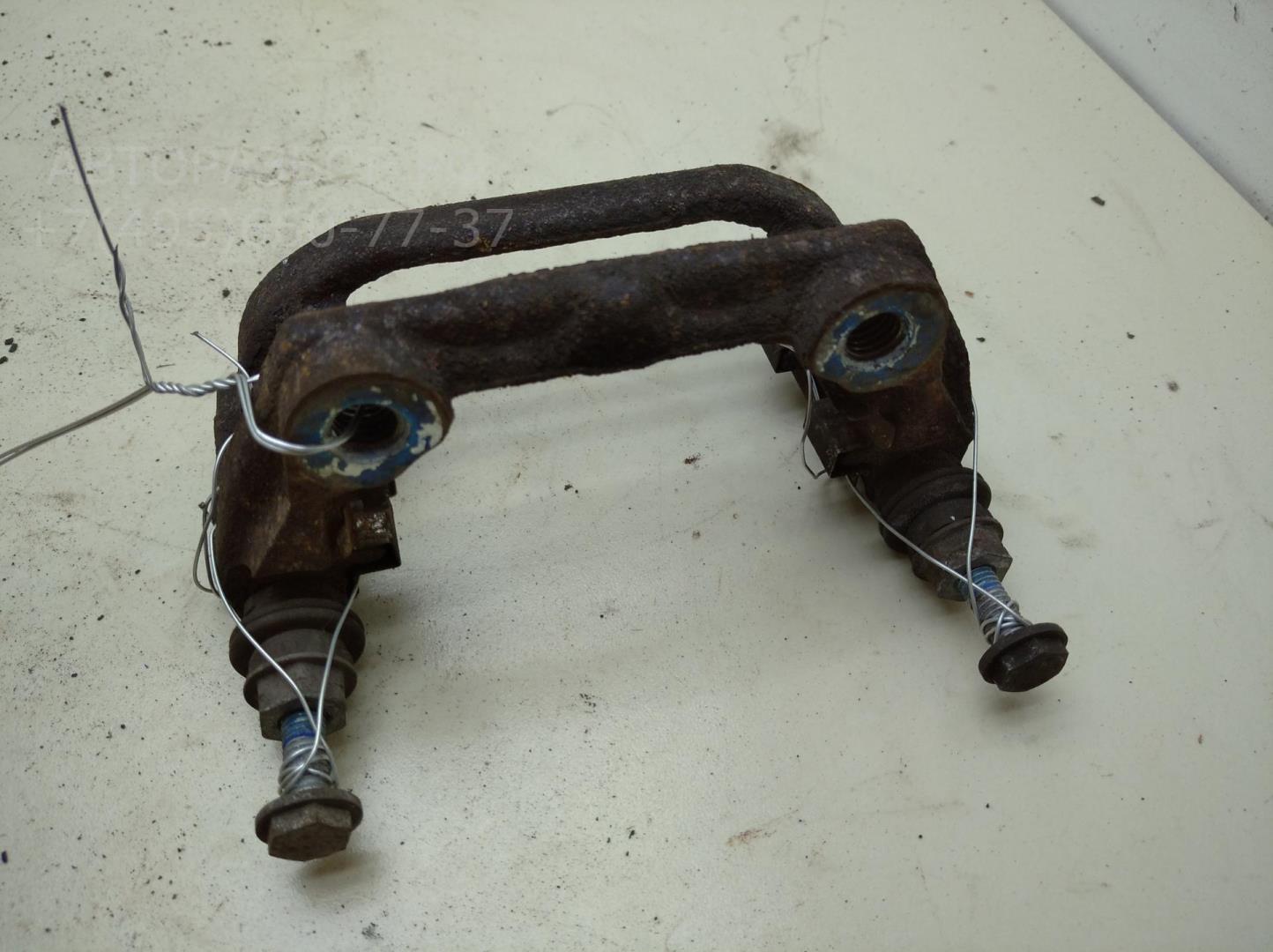 Скоба суппорта заднего