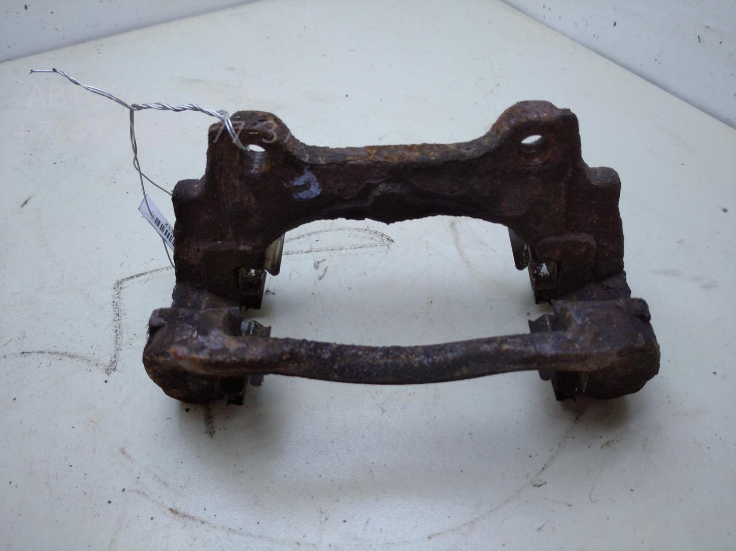 Скоба суппорта переднего