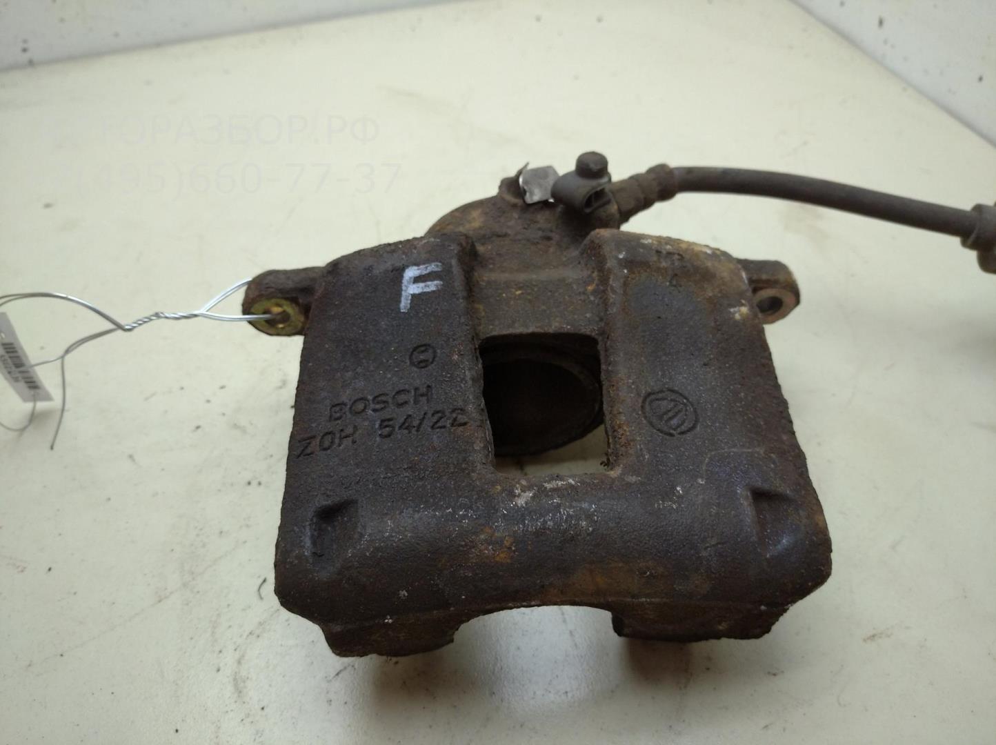 Суппорт передний левый