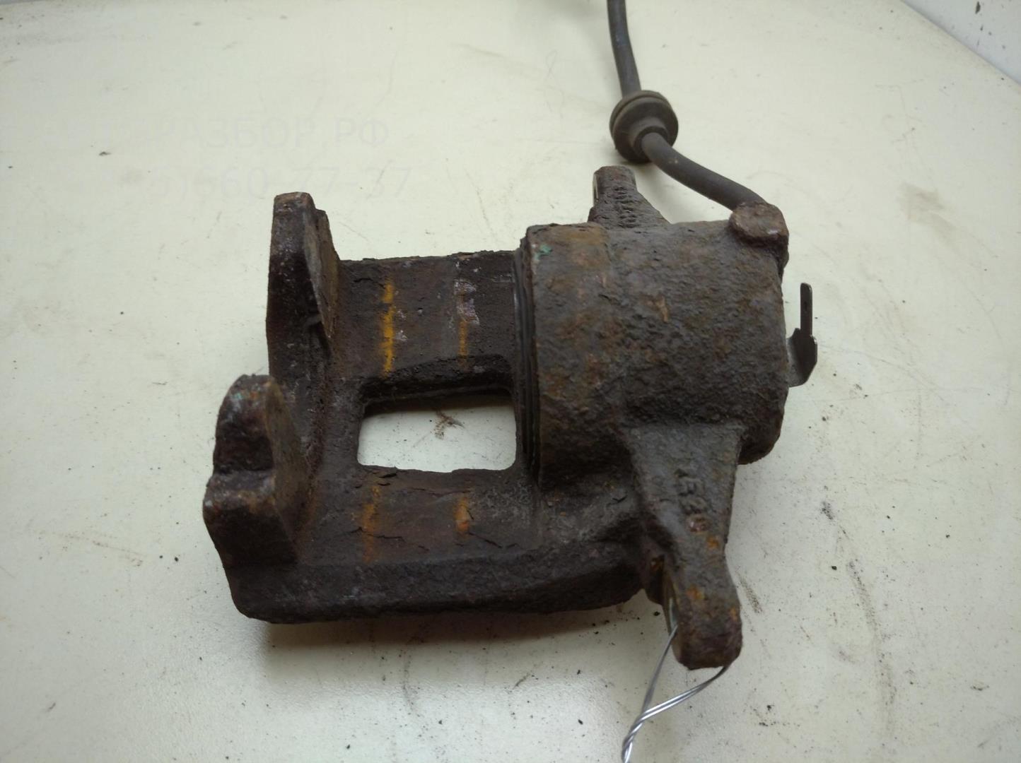 Суппорт передний левый