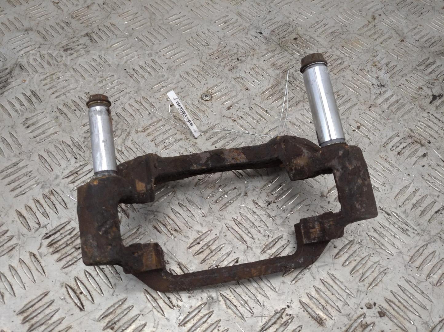 Скоба суппорта переднего