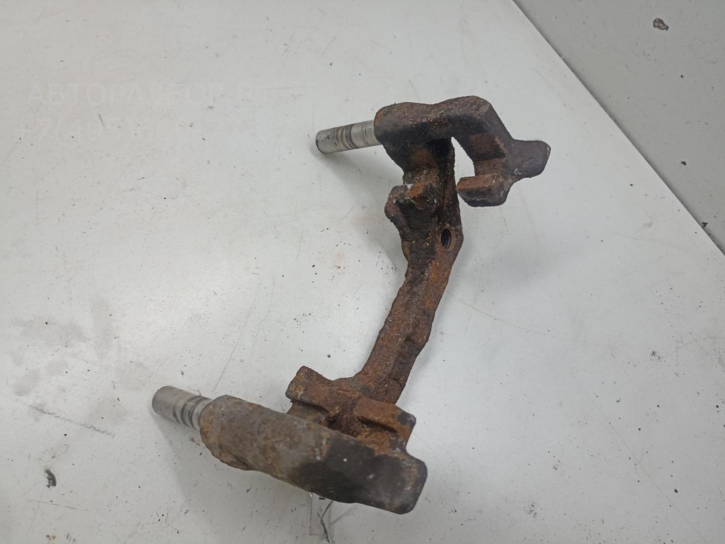 Скоба суппорта заднего