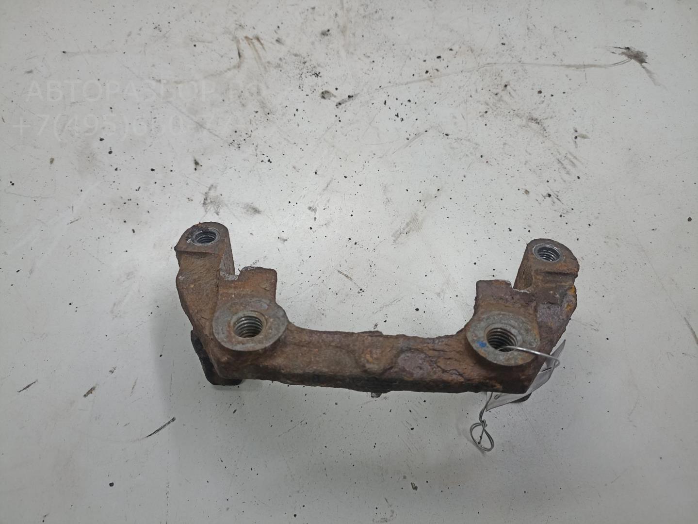 Скоба суппорта заднего