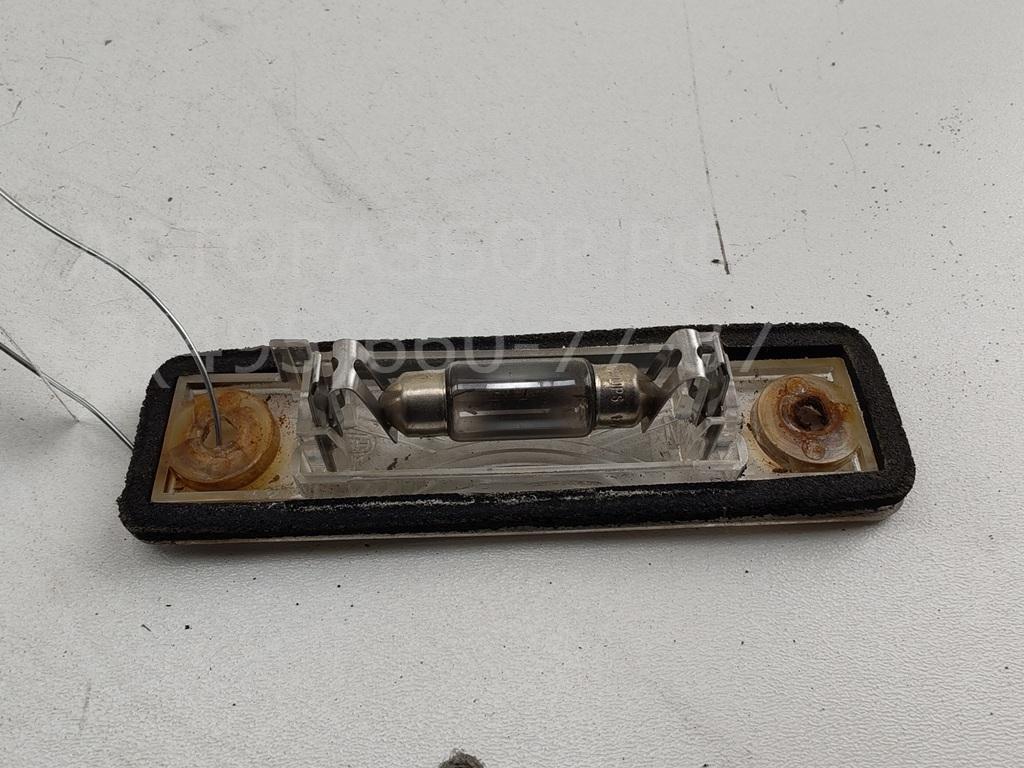 Фонарь подсветки номера