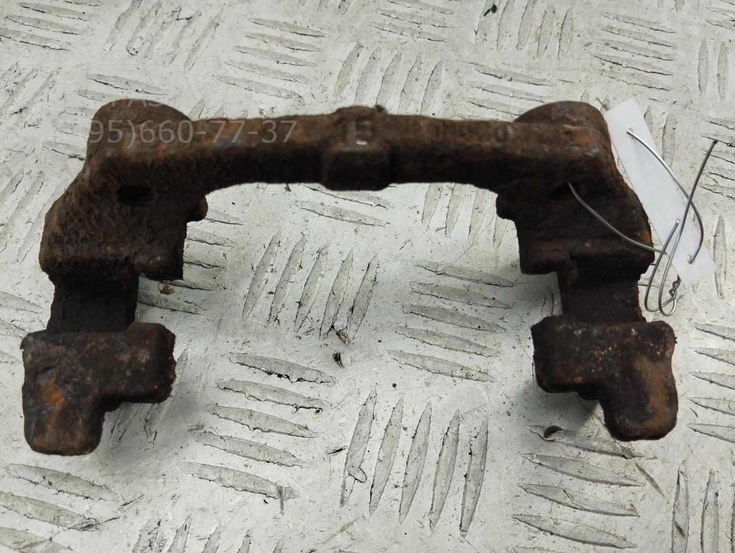 Скоба суппорта заднего