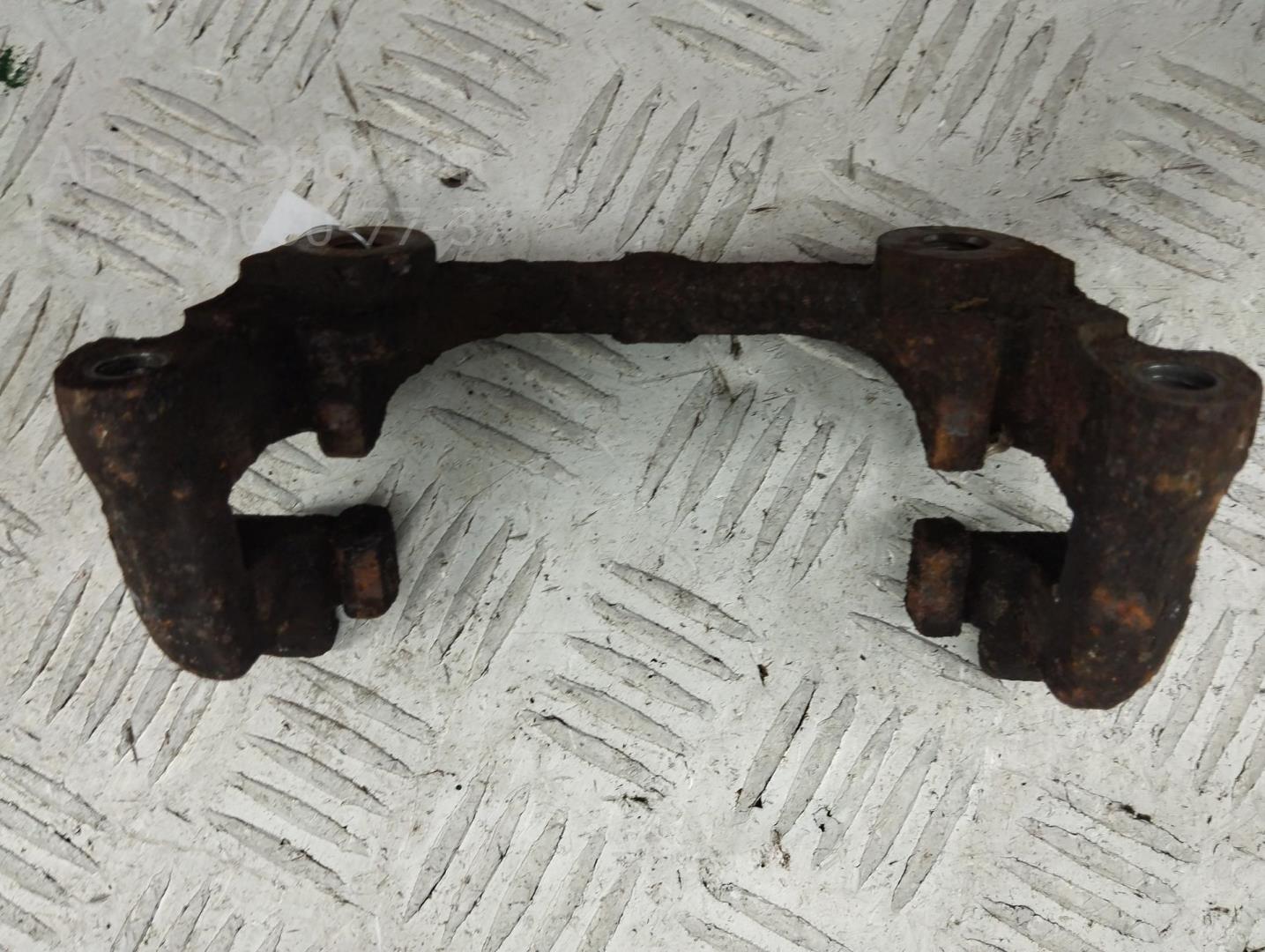 Скоба суппорта заднего