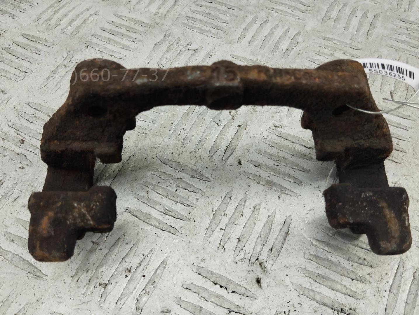 Скоба суппорта заднего